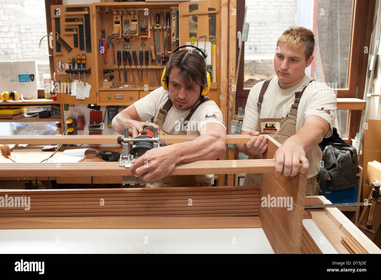 Duesseldorf, Germany, journeyman and apprentice in a carpenter's