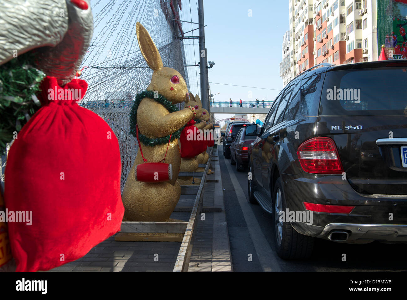 Statues of Tuye or The Moon Rabbit are decorated alongside a street ...