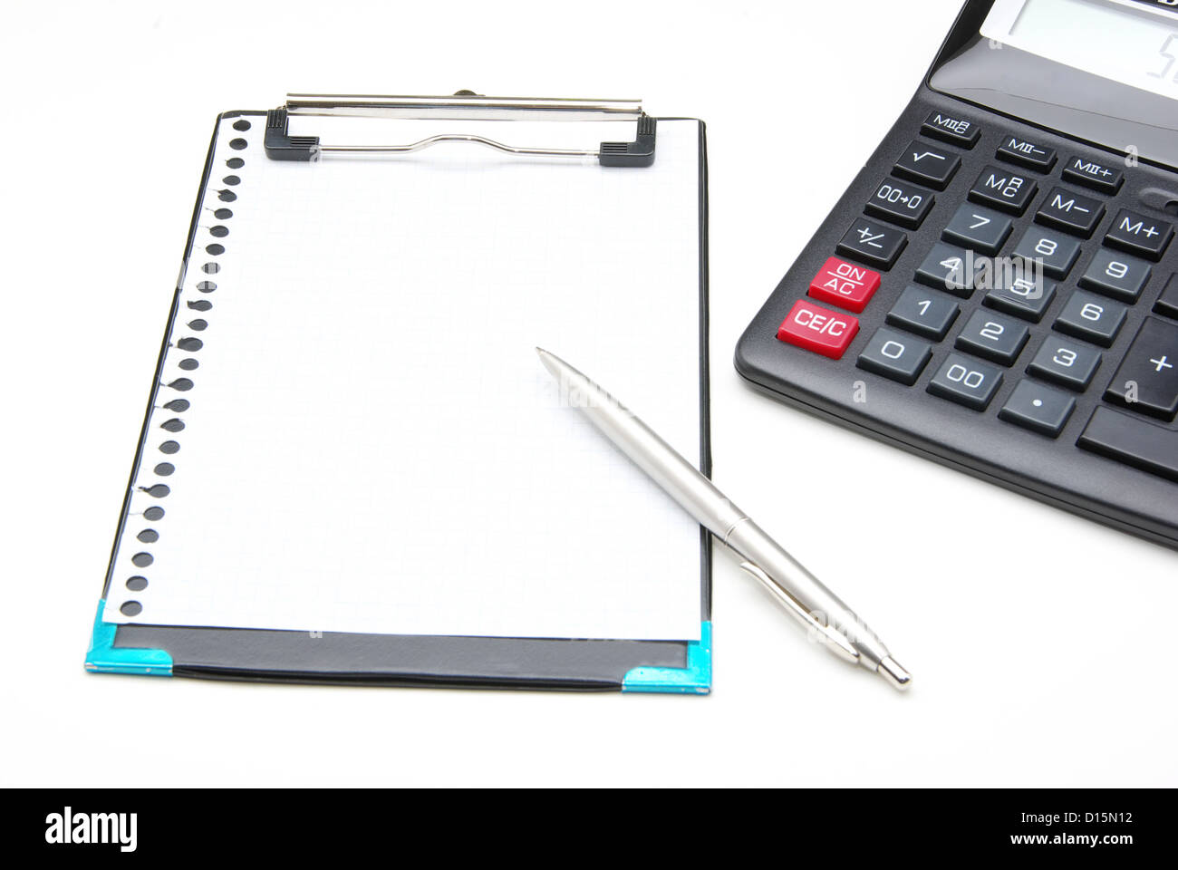 calculator and pen on a white background Stock Photo - Alamy