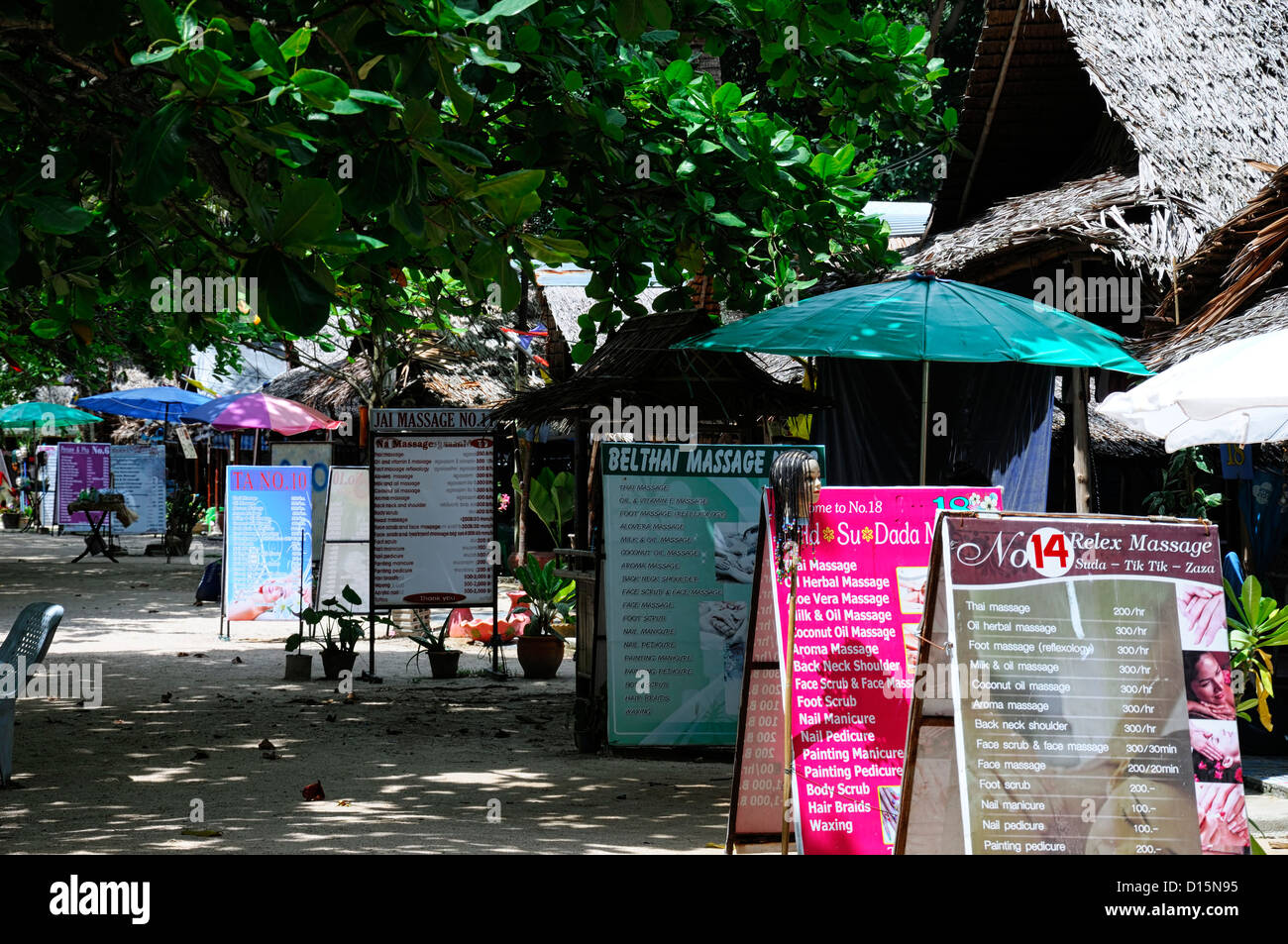 beachfront massage parlour parlours rooms huts shops cheap ao nang krabi thailand beside beach close convenient Stock Photo