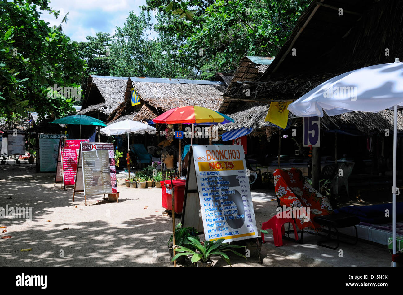 beachfront massage parlour parlours rooms huts shops cheap ao nang krabi  thailand beside beach close convenient Stock Photo - Alamy