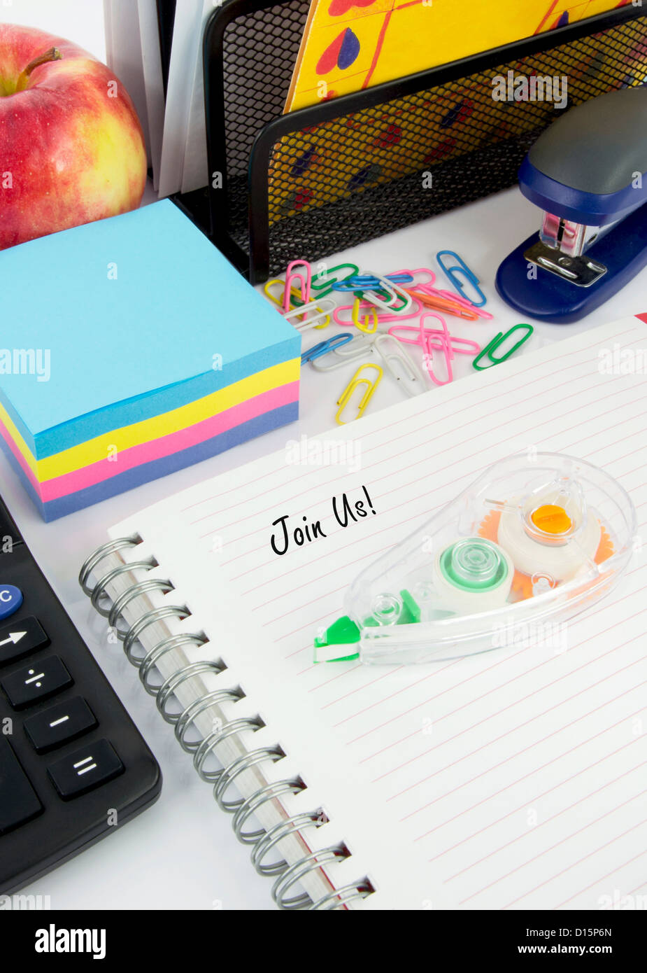 Join Us caption on notepad Stock Photo