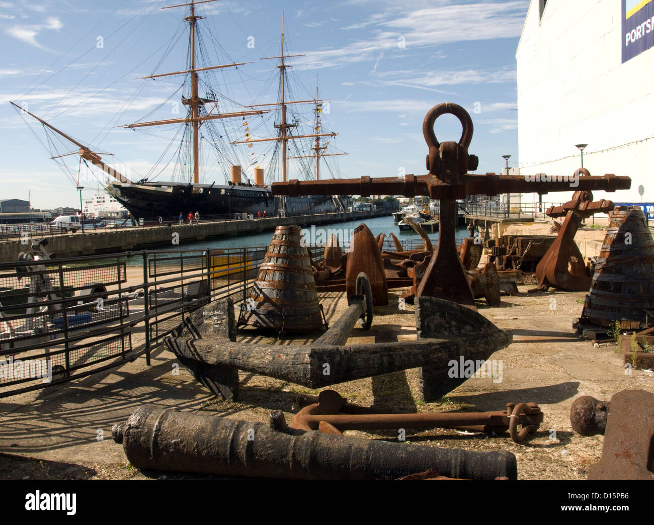 HAMPSHIRE; PORTSMOUTH; NAVAL DOCKYARD; 19TH CENTURY WARSHIP ANCHORS & GEAR WITH H.M.S VICTORY IN BACKGROUND Stock Photo