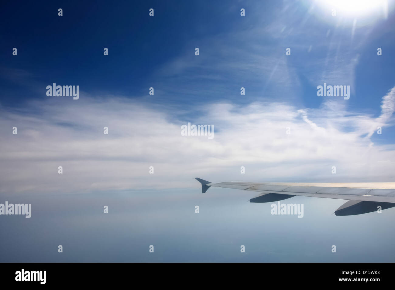 Wing plane above cloud formation hi-res stock photography and images ...