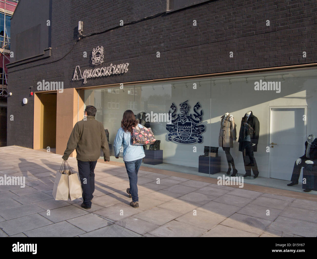 Chinese tourists visit luxury Aquascutum new outlet store in Hackney, London,  next to Burberry outlet Stock Photo - Alamy