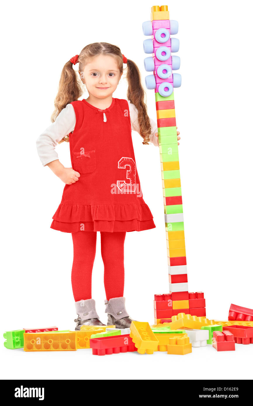 full-length-portrait-of-a-little-girl-playing-with-colorful-bricks