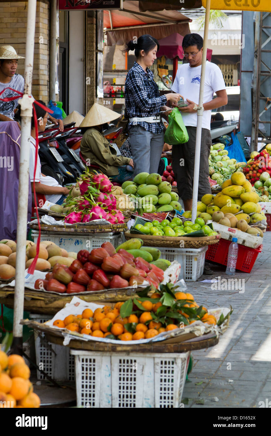 Sale of Vegetables and Fruits on a Market in Ho Chi Minh City, Vietnam Stock Photo