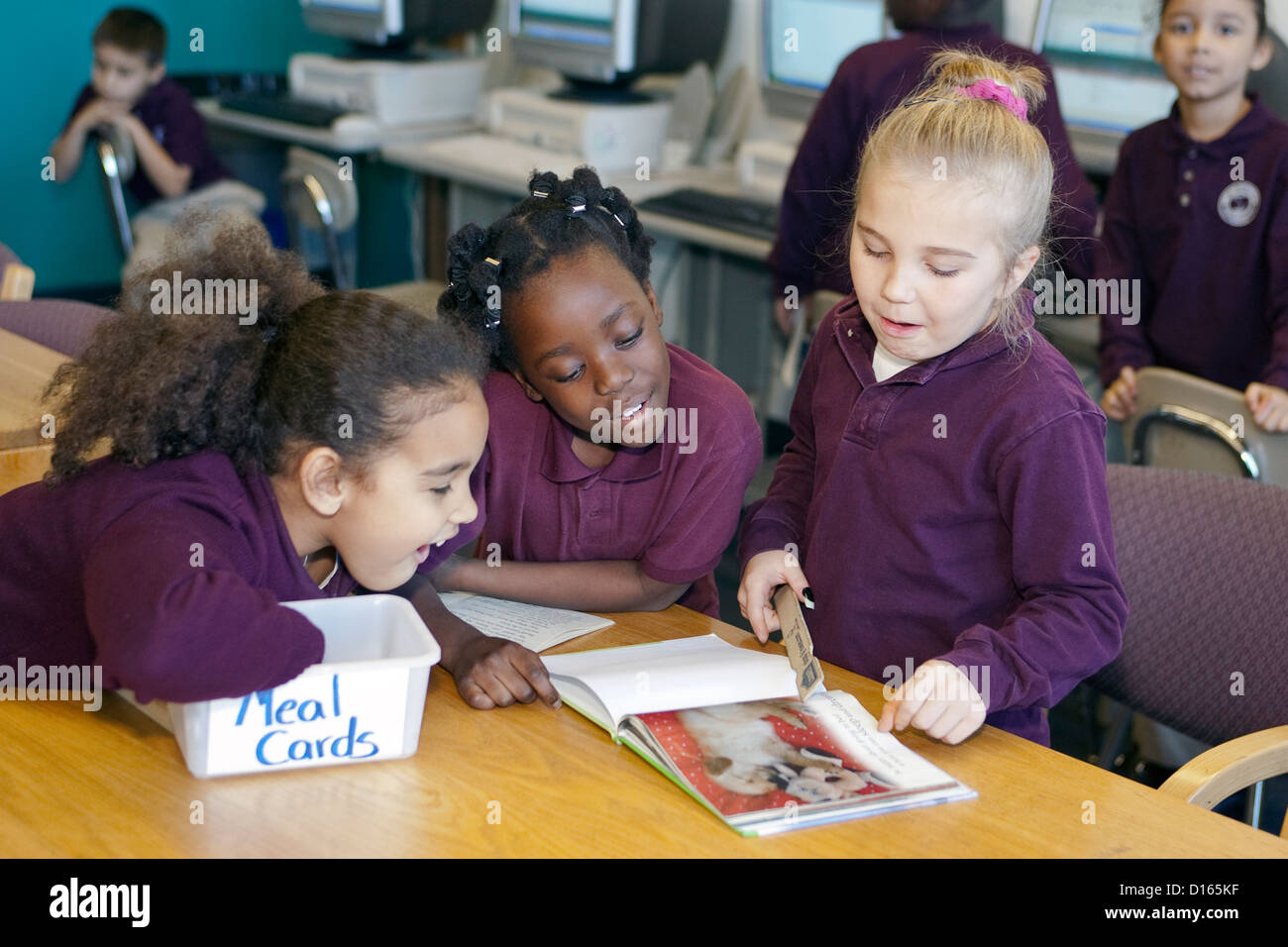 African girl reading book hi-res stock photography and images - Alamy