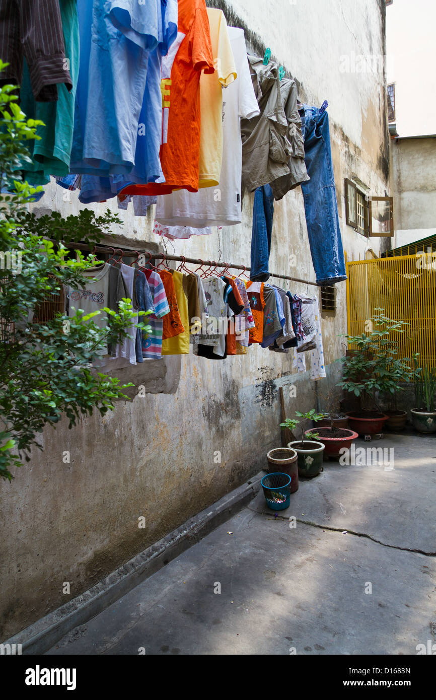 Laundry hung out to dry on an exterior Facade in Ho Chi Minh City