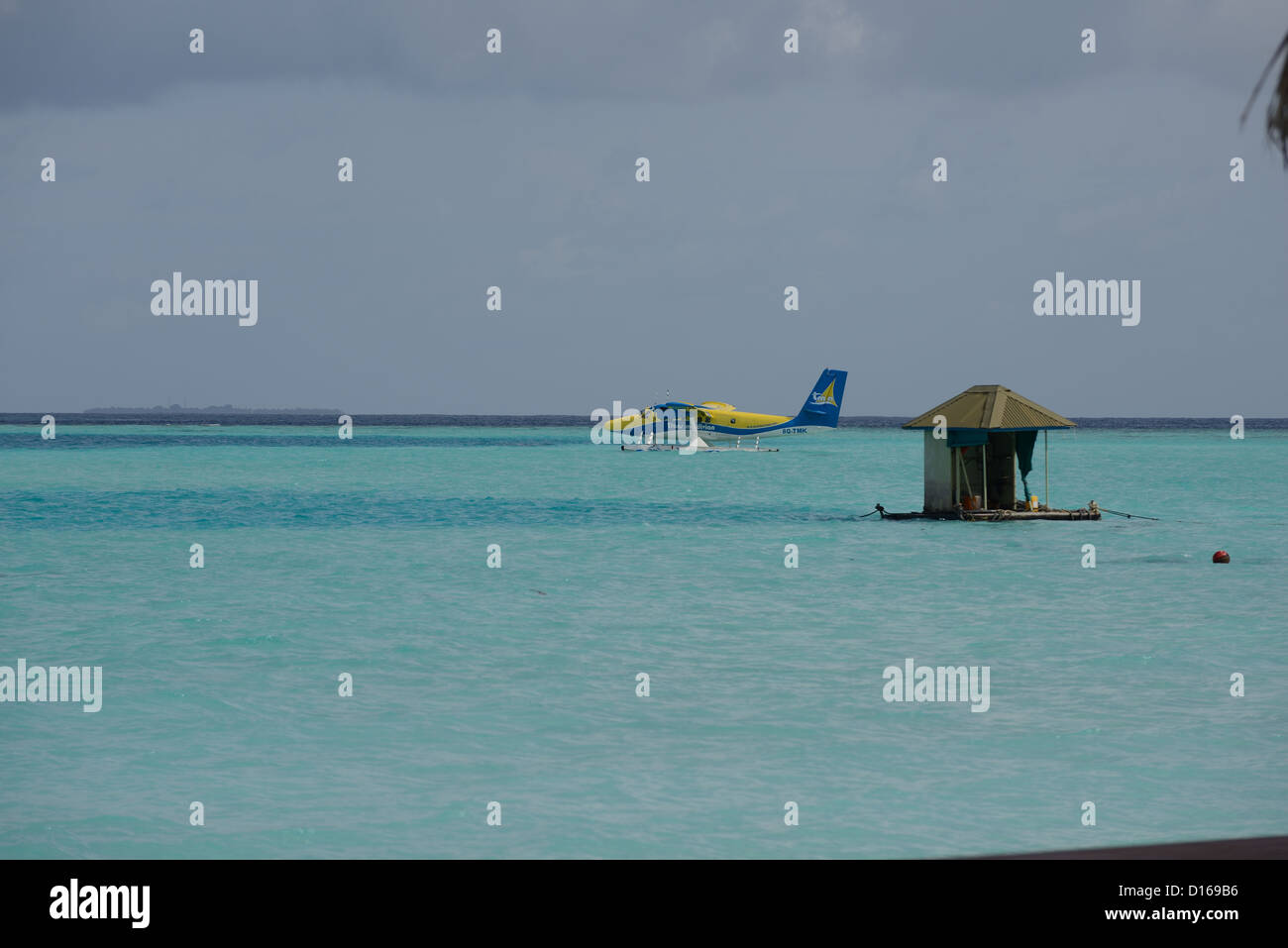 Maldives seaplane blue sea tranquil beach lagoon Stock Photo
