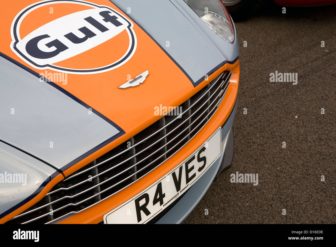 The front of a modern Aston Martin supercar in Gulf coloured livery. Stock Photo