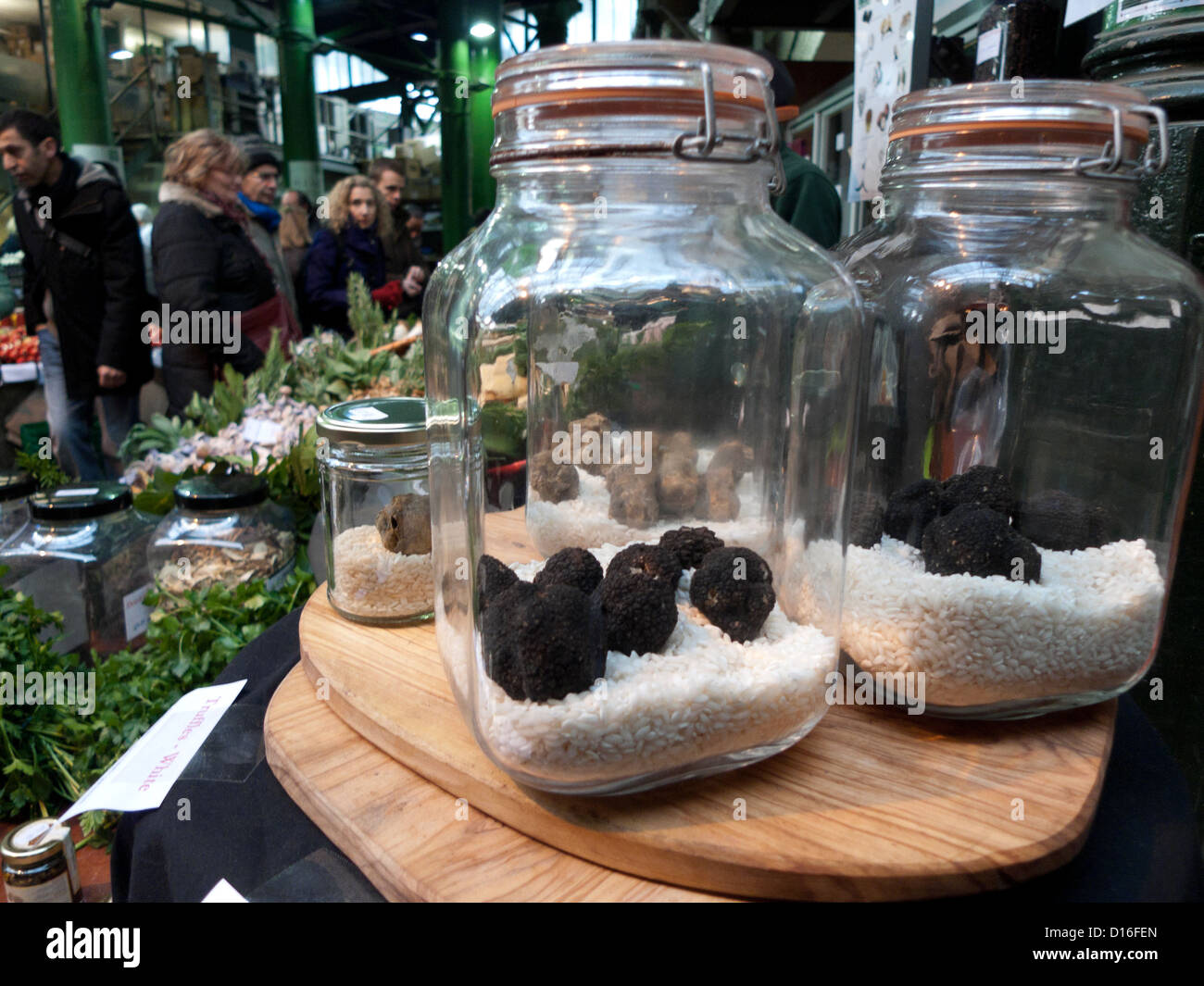 Black and white fresh truffles from Molise Italy displayed in glass jars Borough Market, London Bridge, London  UK KATHY DEWITT Stock Photo