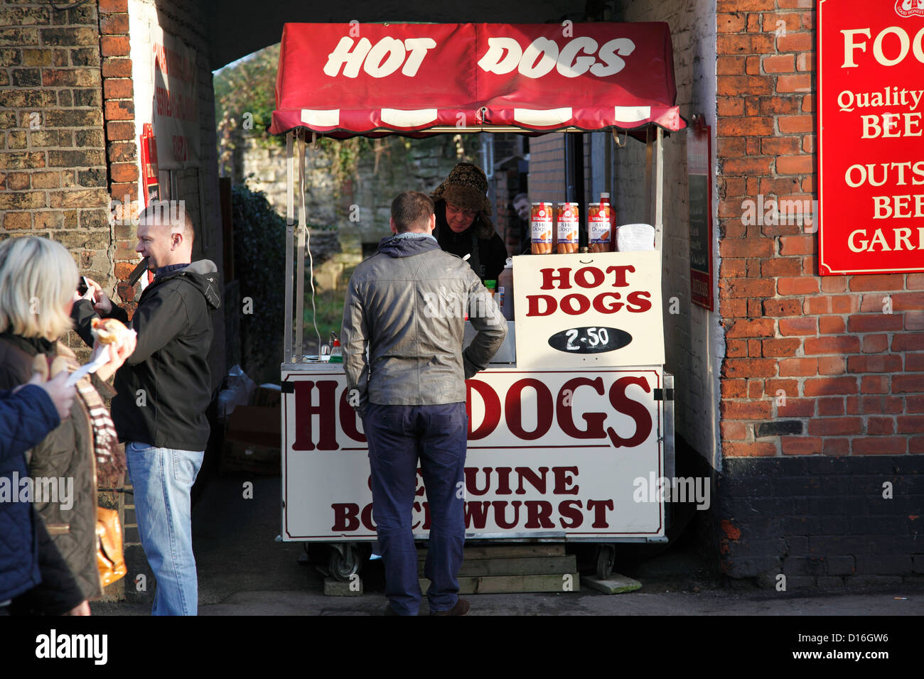 A hot dog seller at the Lincoln Christmas Market, England, U.K. Stock Photo