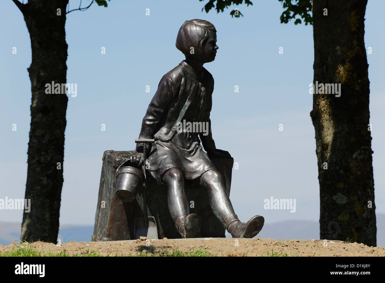 Bronze sculpture by Angela Hunter entitled Girl on a Suitcase beside the Firth of Clyde in Gourock, Inverclyde, Scotland, UK Stock Photo