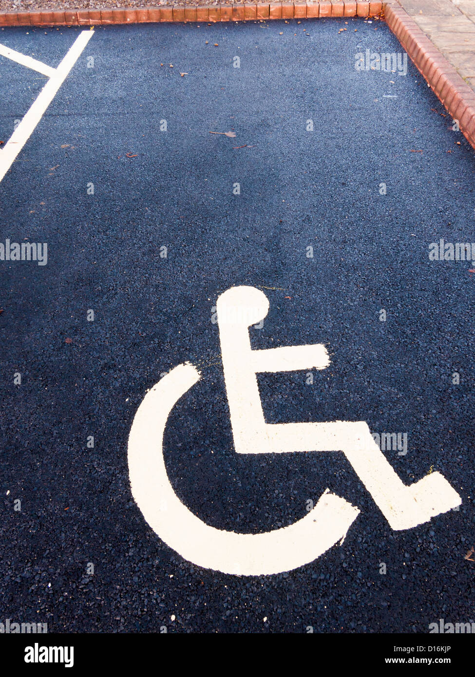 Newly marked disabled parking space for disabled badge holders only Stock Photo