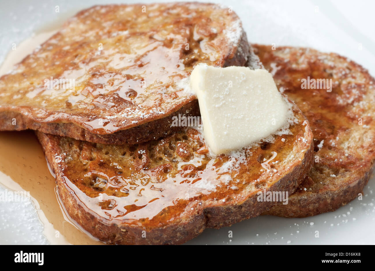 Fresh whole grain french toast with butter and maple syrup Stock Photo