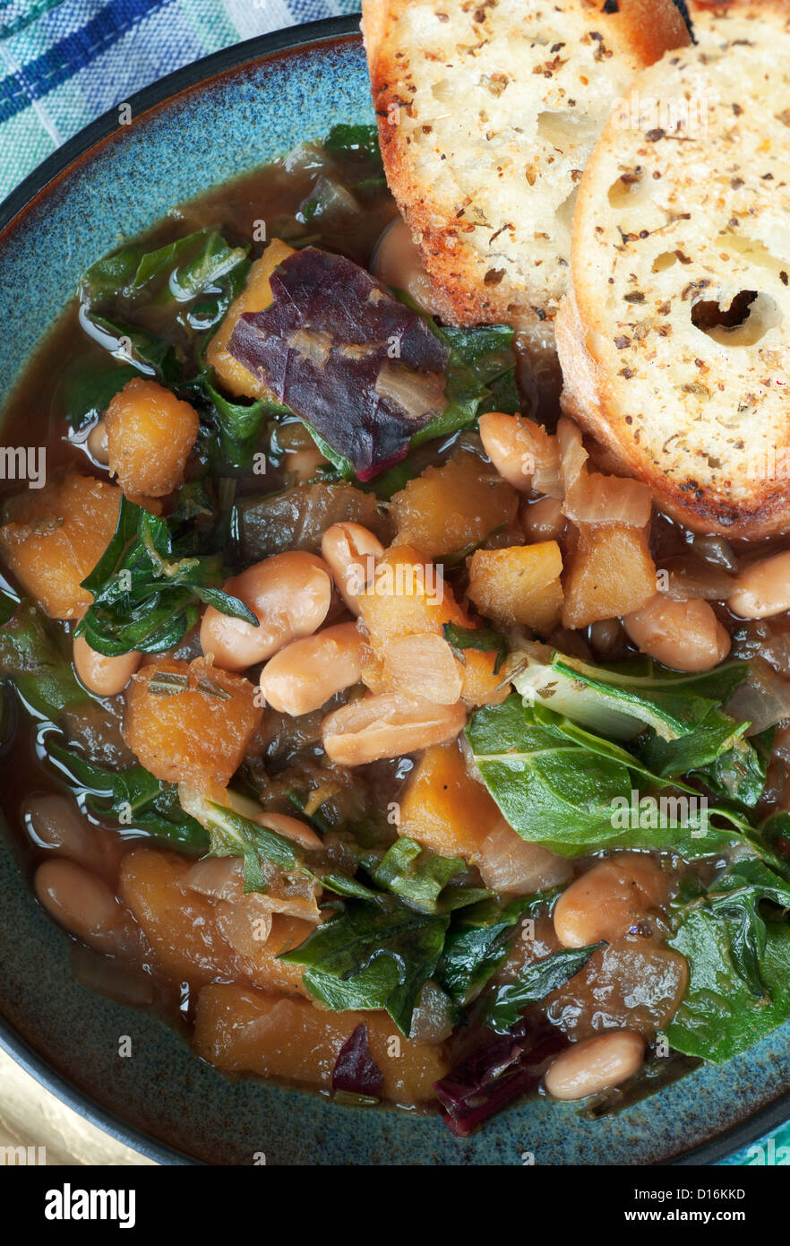 Fresh white navy bean soup with garden vegetables Stock Photo