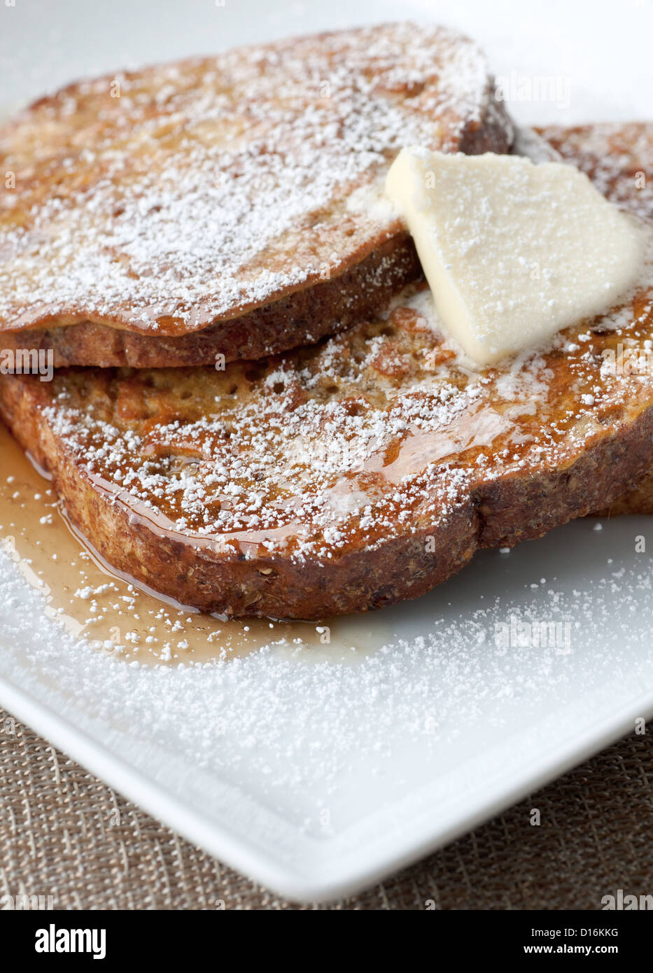 Fresh whole grain french toast with butter and maple syrup Stock Photo