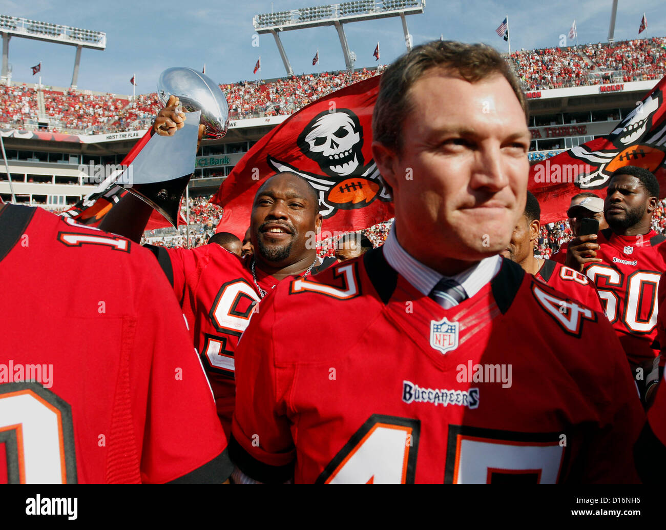 Tampa Bay Buccaneers' head coach Jon Gruden greets Denver Broncos' John  Lynch (who played for the Buccaneers during the 2003-04 season) before the  game at Raymond James Stadium on Oct. 3, 2004.