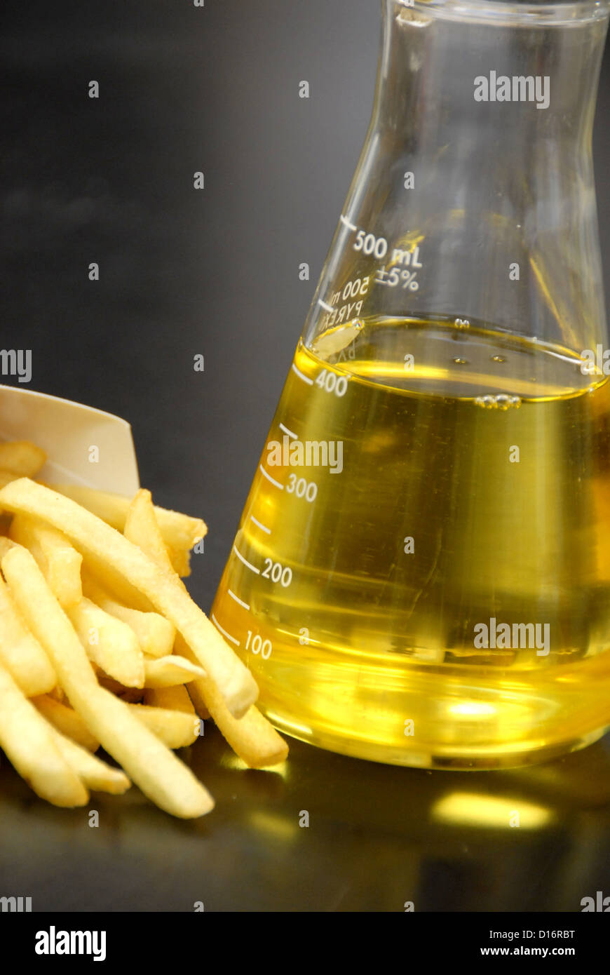 French fries with cooking oil Stock Photo Alamy