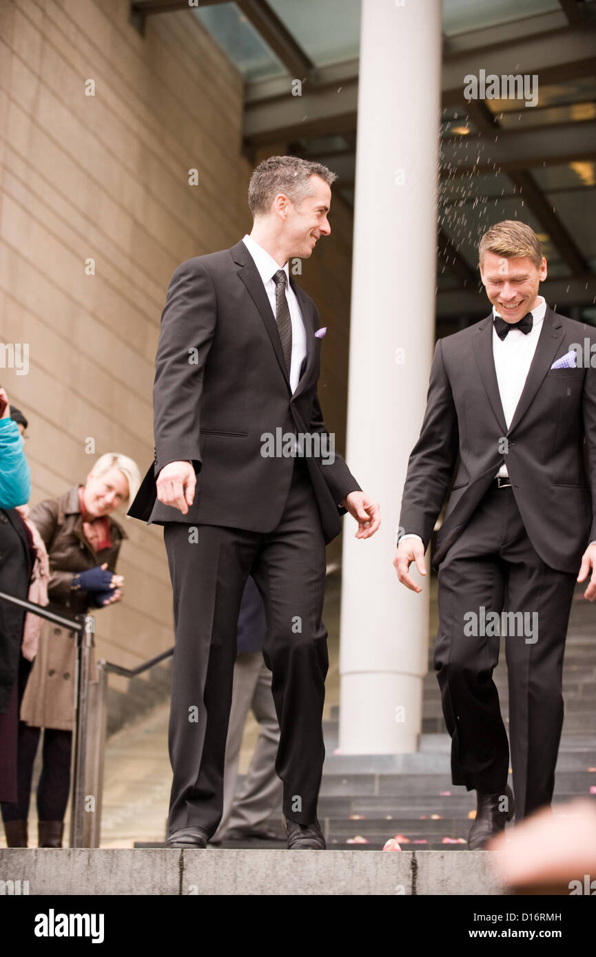 Seattle's Dan Savage (left) and Terry Miller (right) celebrate their