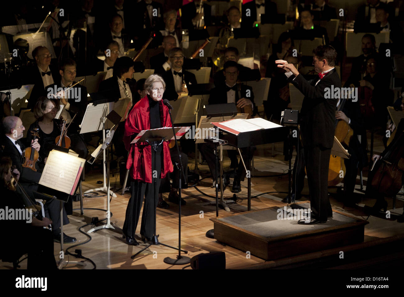 Dec. 9, 2012 - Boston, Massachusetts, U.S - U.S. Sen.-elect Elizabeth Warren (D-Mass.) recites the classic Christmas poem, ''A Visit From St. Nicholas,'' with the Boston Pops at their Holiday Pops concert at Symphony Hall on Dec. 9, 2012. The poem is most  known for its opening line, ''Twas the Night Before Christmas. (Credit Image: © Kelvin Ma/ZUMAPRESS.com) Stock Photo