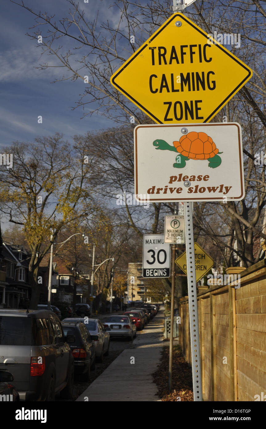 Traffic Calming Zone sign on a residential street in Toronto. Speed limit slower than normal, 30