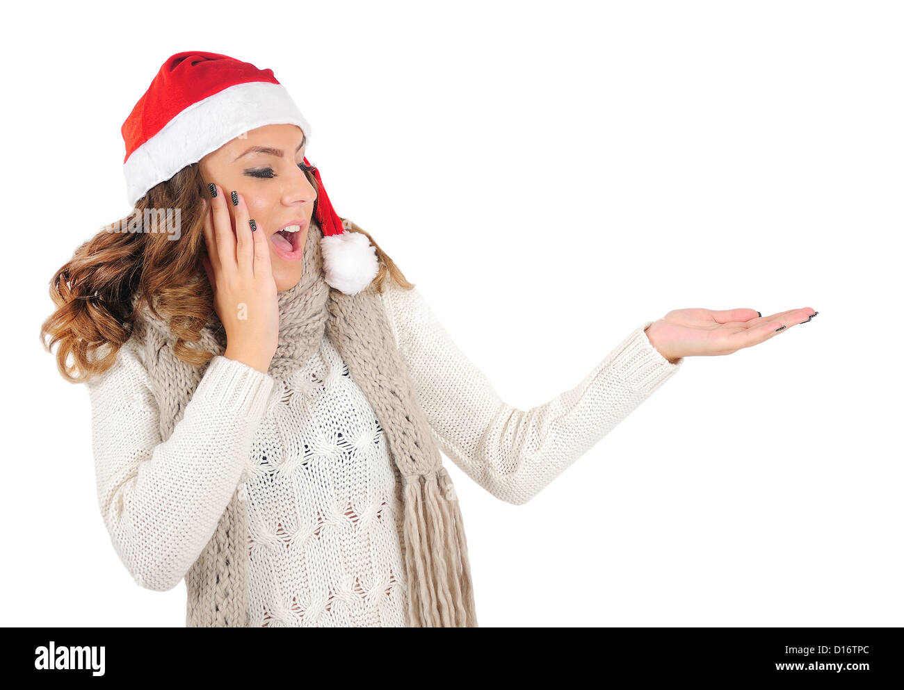 Isolated young christmas girl holding palm Stock Photo - Alamy