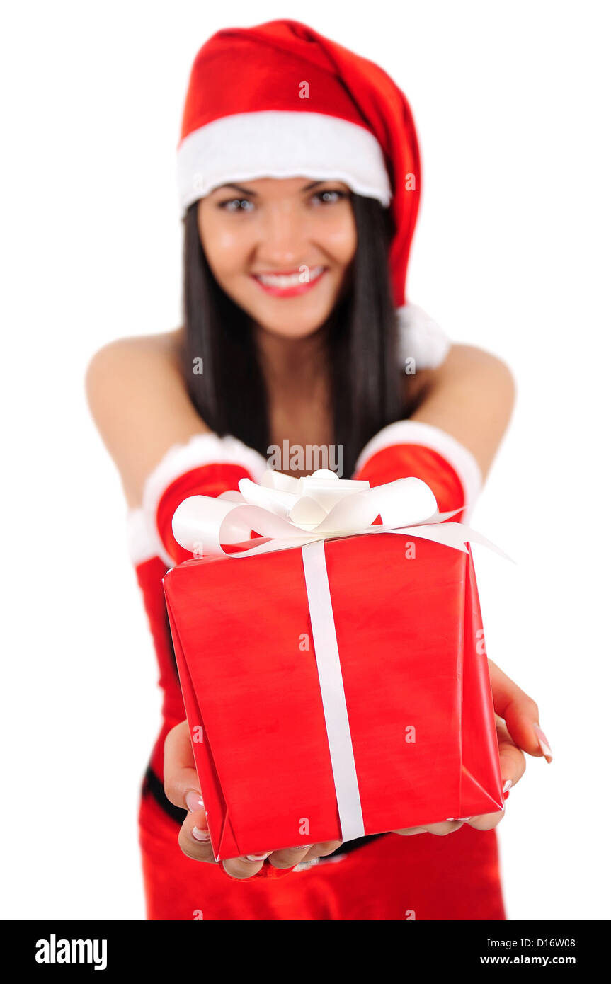 Isolated young christmas girl giving gift Stock Photo - Alamy