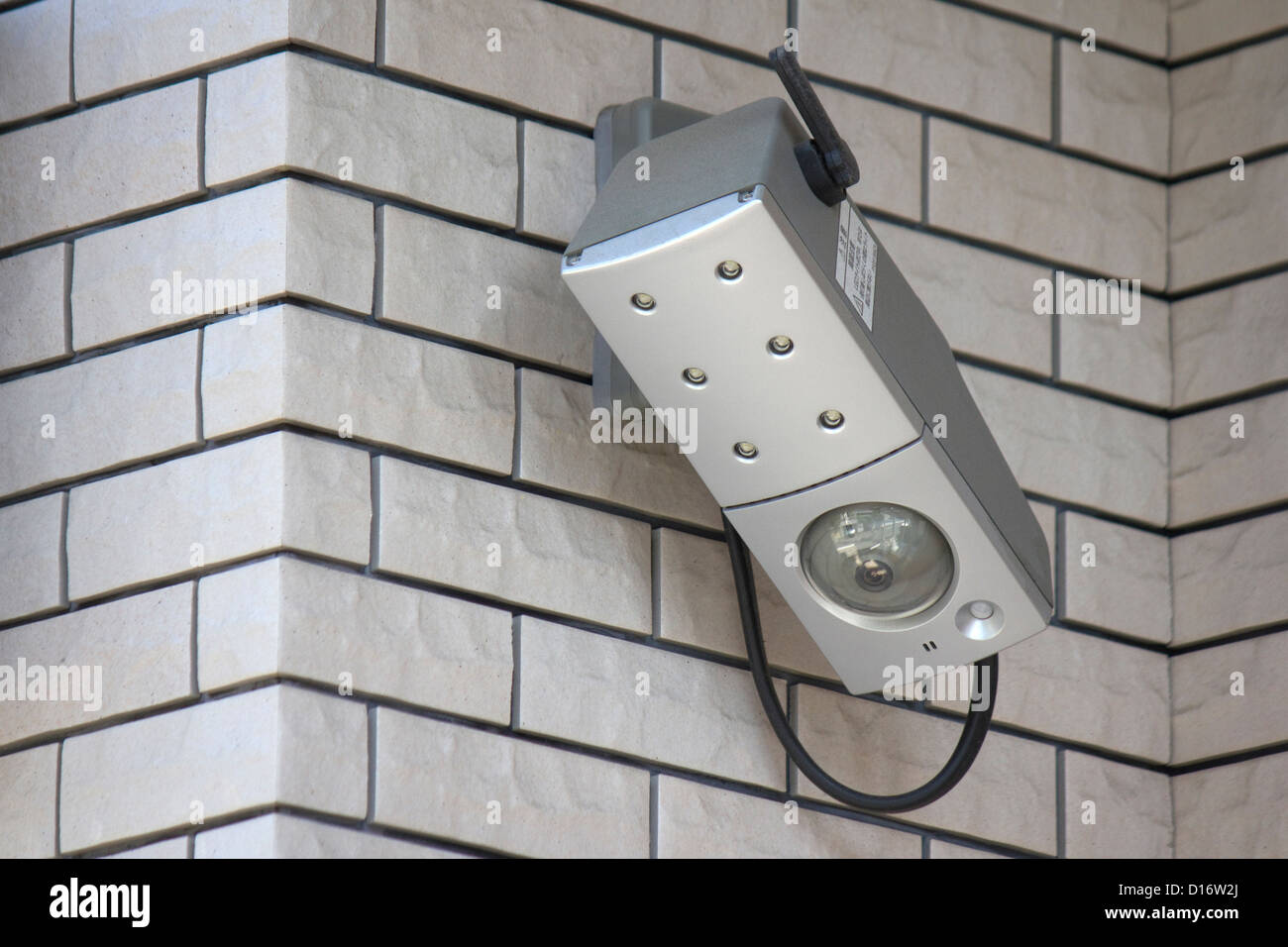 Security camera installed on wall Stock Photo