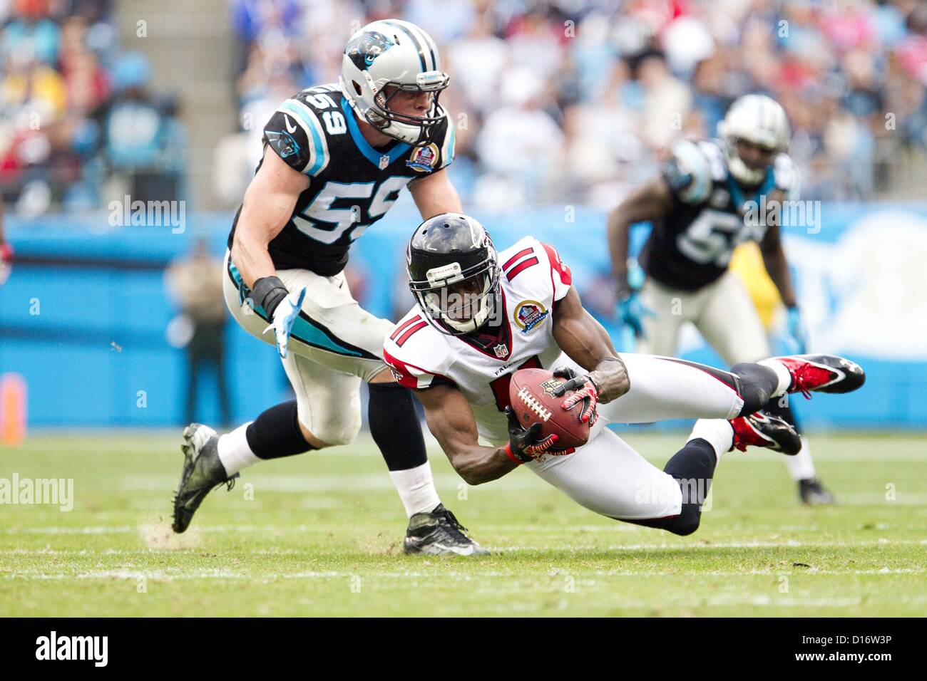 Carolina Panthers vs. Atlanta Falcons. Fans support on NFL Game. Silhouette  of supporters, big screen with two rivals in background Stock Photo - Alamy