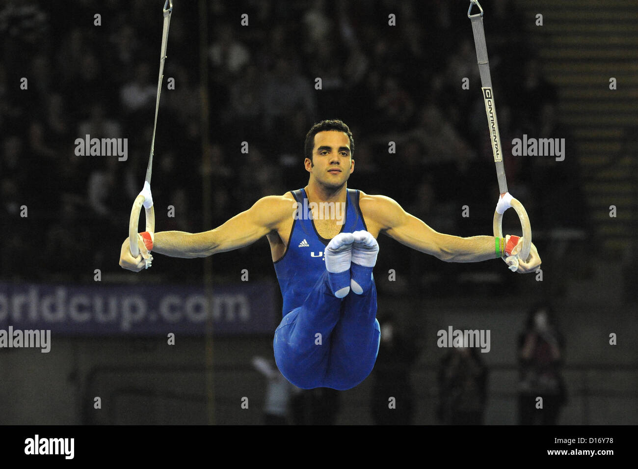 Glasgow, UK. 8th Dec, 2012. Danell Leyva, USA holding an Iron Cross during rings segment of the Glasgow World Cup at the Emirates Arena. Stock Photo