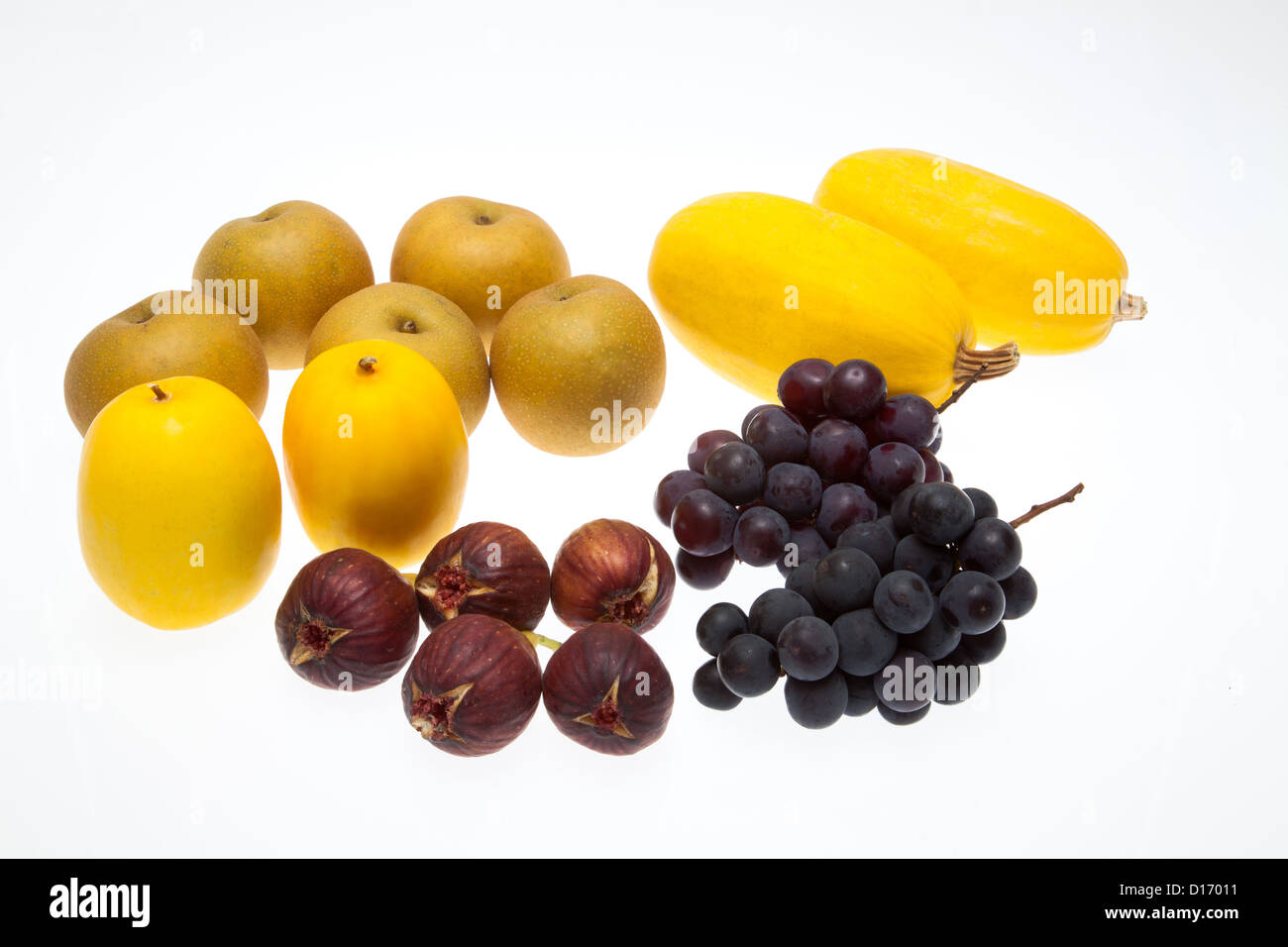 Various types of fruits against white background Stock Photo