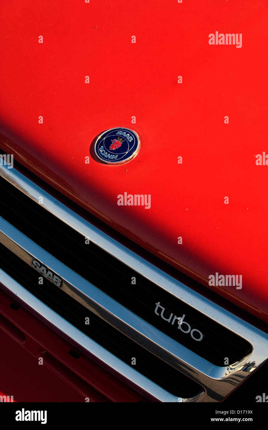 The front grill of a red Saab Turbo. Stock Photo