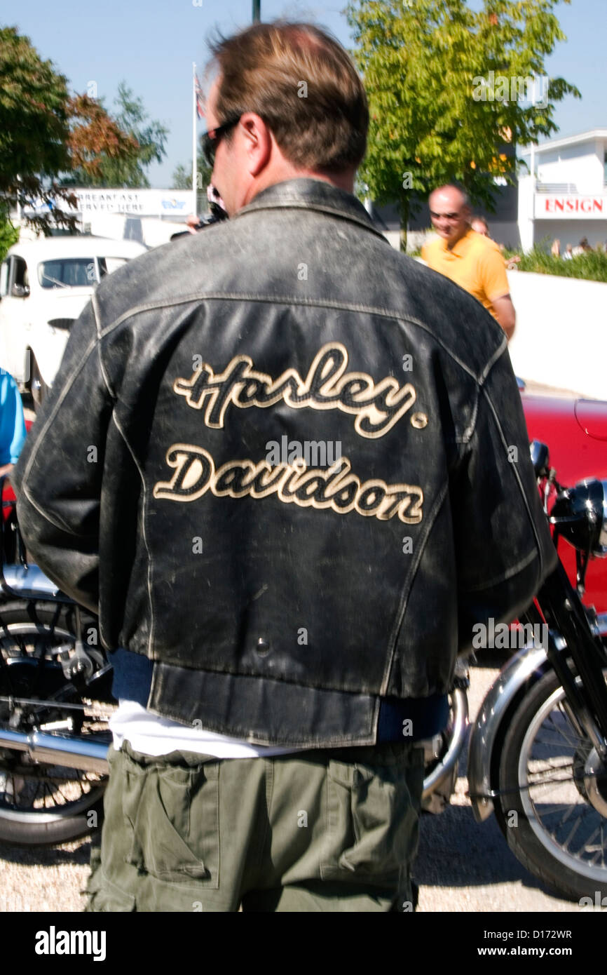 A biker wearing a Harley Davidson leather jacket Stock Photo - Alamy
