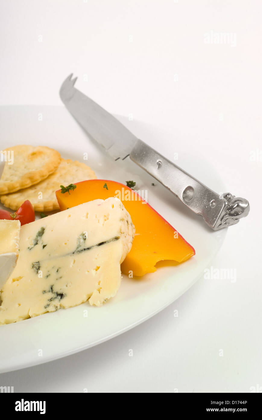 Cheese platter with various cheeses and knife Stock Photo Alamy
