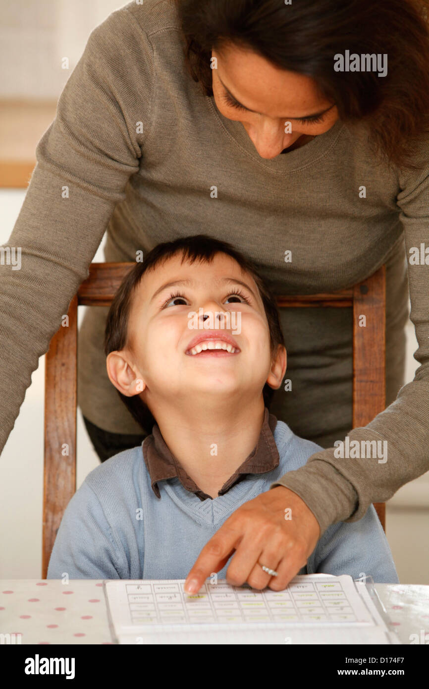 6-year-old boy with his mother Stock Photo