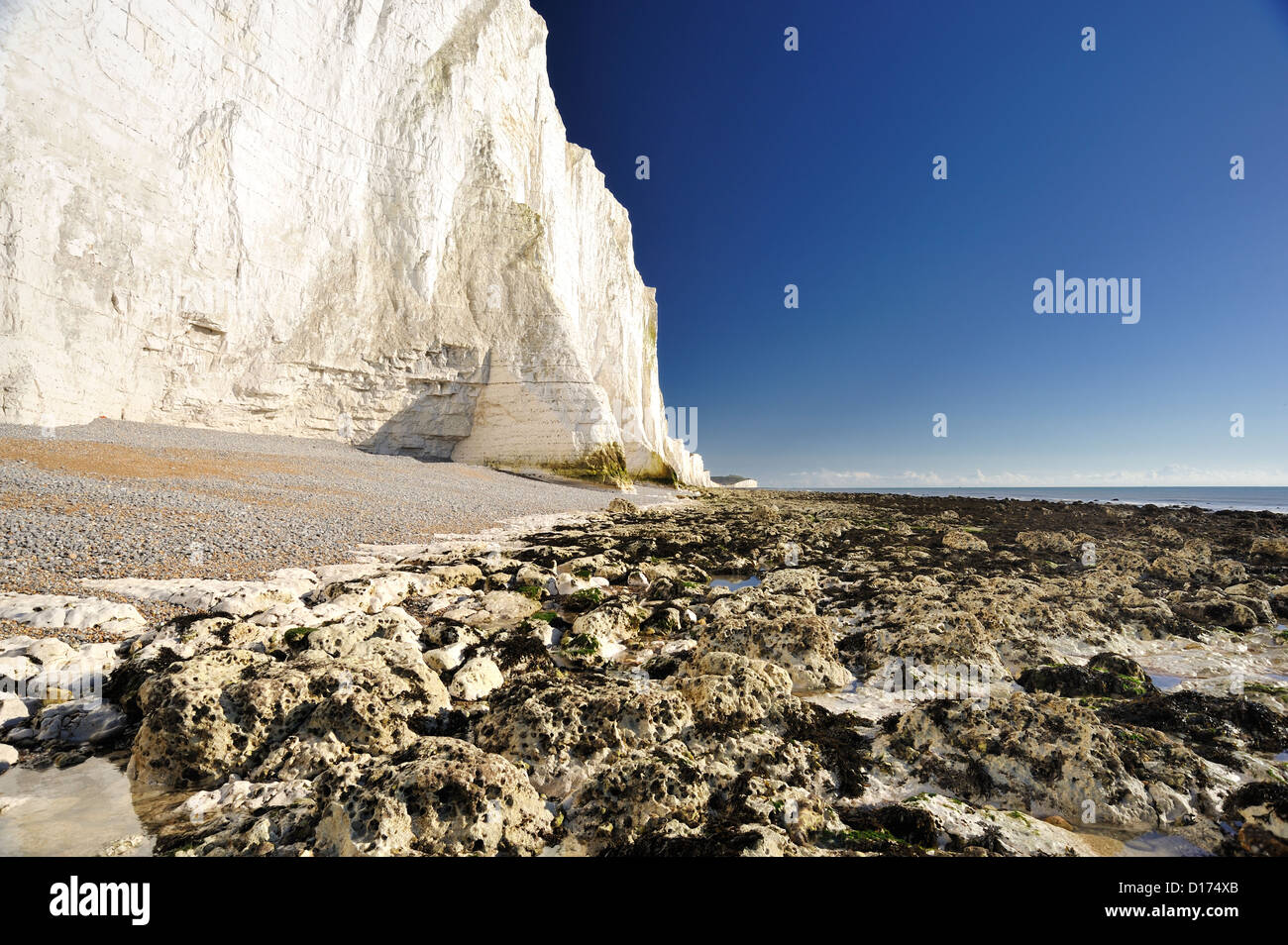 High chalk cliffs along the coastline Stock Photo