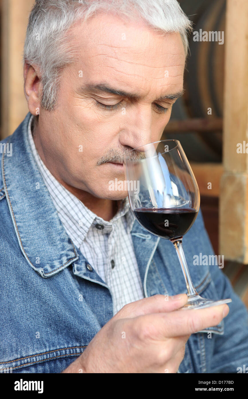 Vintner tasting wine Stock Photo