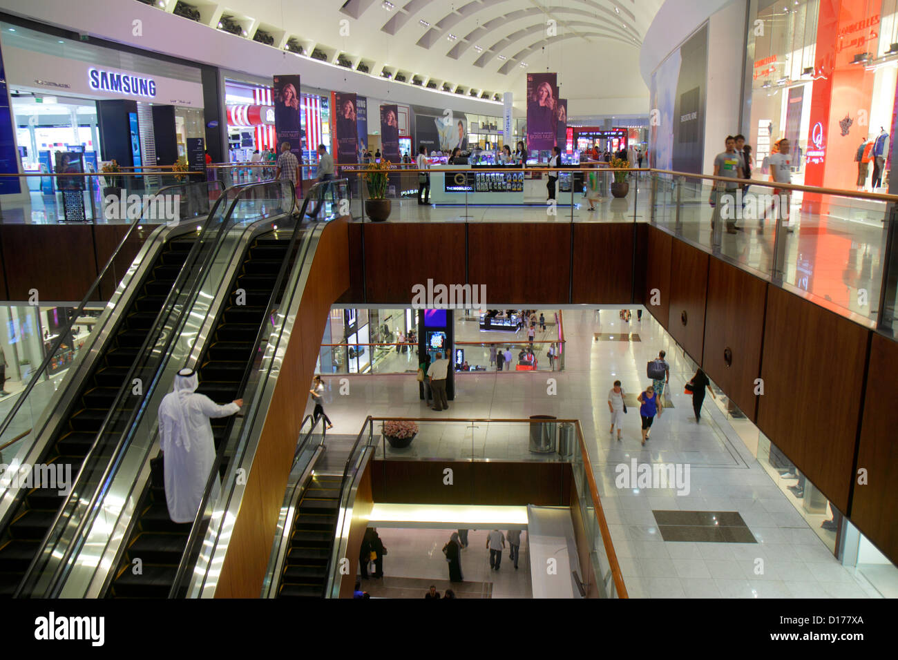 Dubai UAE,United Arab Emirates,Downtown Dubai,Burj Dubai,Dubai mall,store,stores,businesses,district,Samsung,levels,Muslim,Bedouin,Muslim ethnic man m Stock Photo