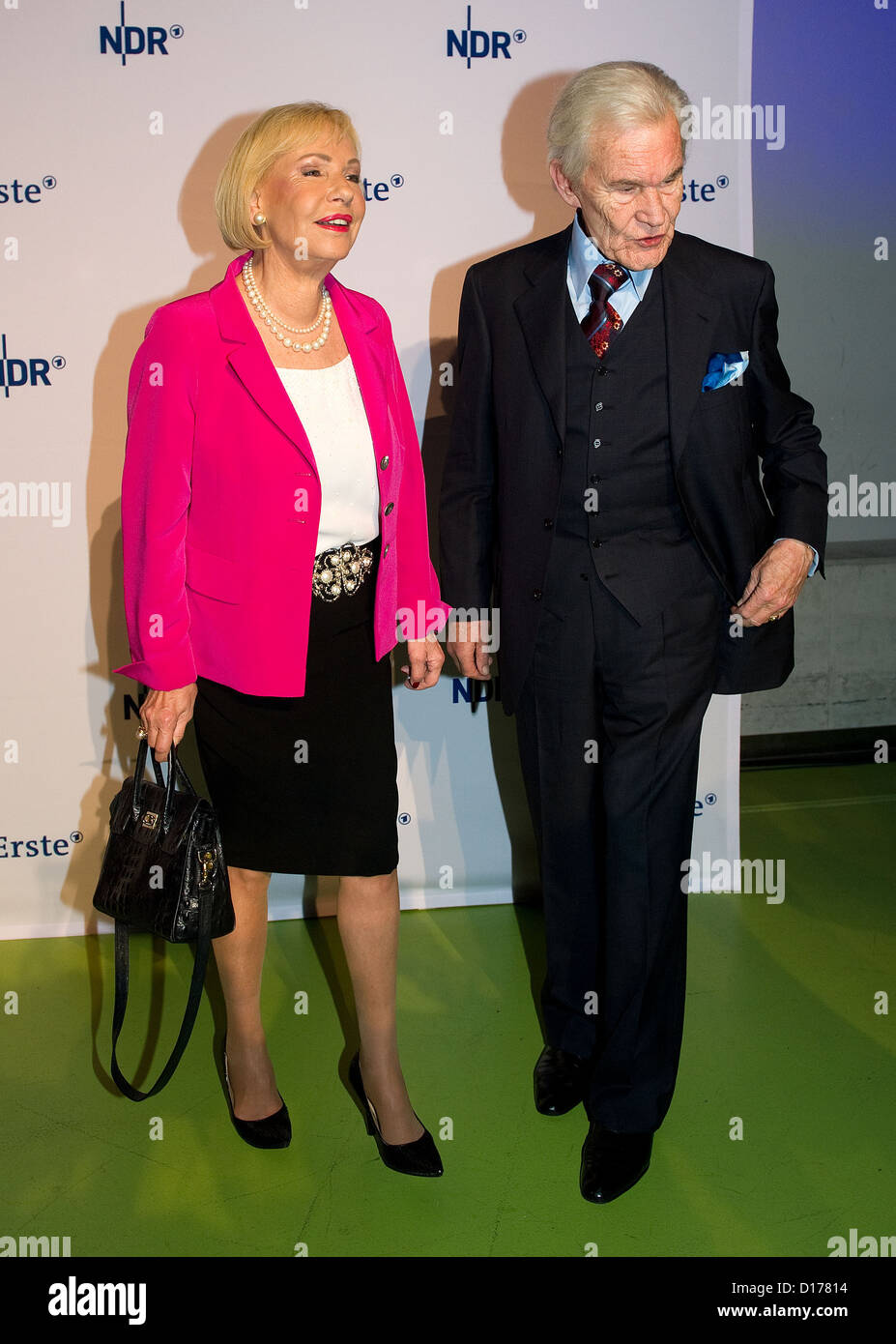 Former 'Tagesschau' hosts Wilhelm Wieben (R), and Dagmar Berghoff pose at the news show's 60th anniversary party at Cruise Center in Hamburg, Germany, 06 December 2012. Photo: Axel Heimken Stock Photo