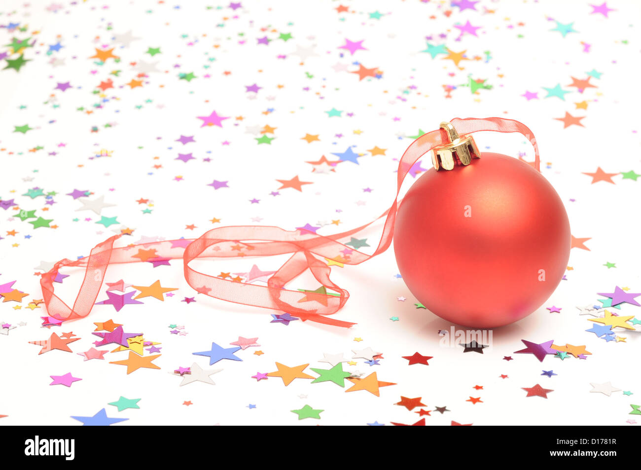 Christmas bauble and stars Stock Photo