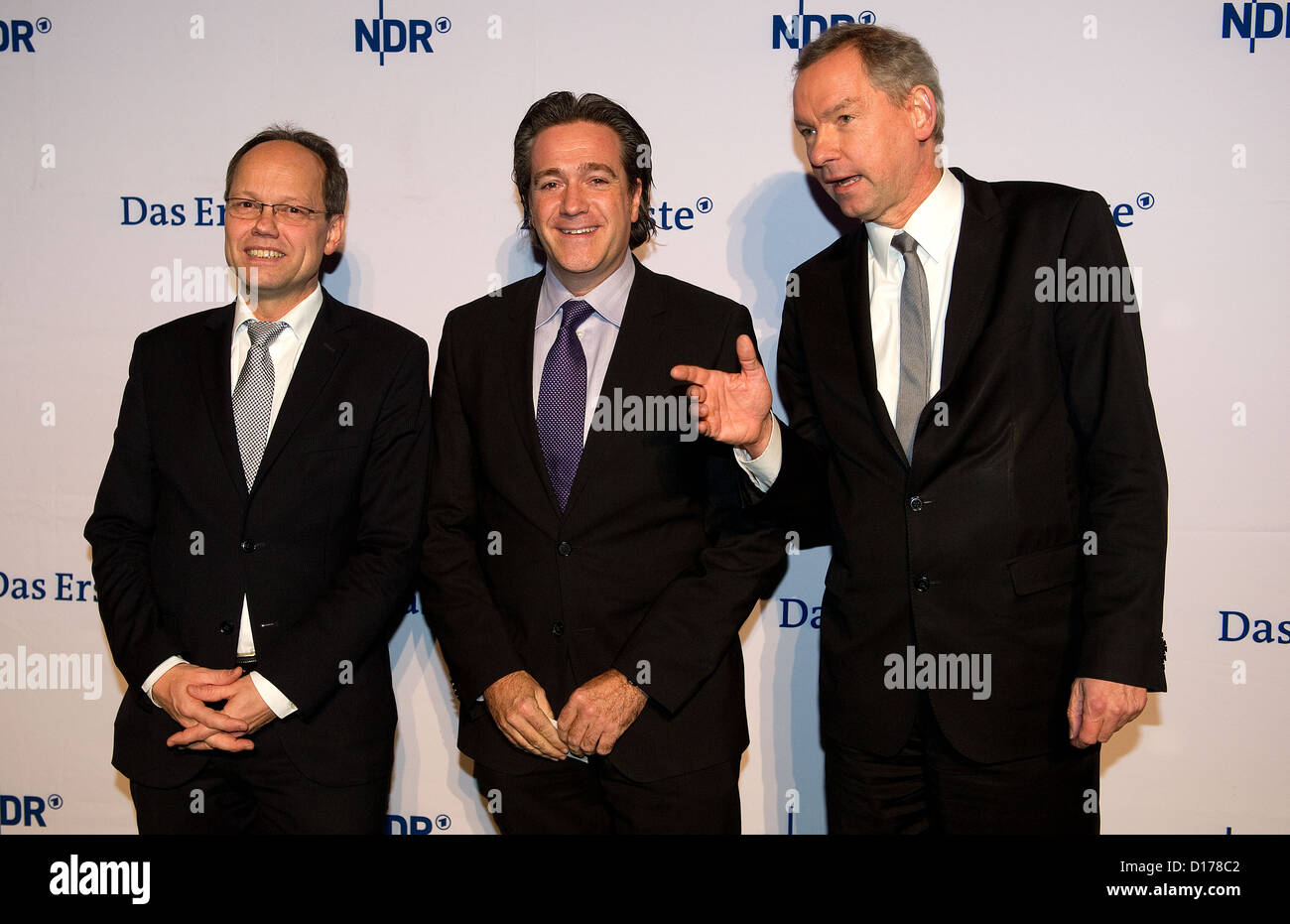 Kai Gniffke (L-R), 'Tagesschau' chief editor, German Press Agency (dpa) chief editor Wolfgang Buechner and NDR director Lutz Marmor pose at the news show's 60th anniversary party at Cruise Center in Hamburg, Germany, 06 December 2012. Photo: Axel Heimken Stock Photo