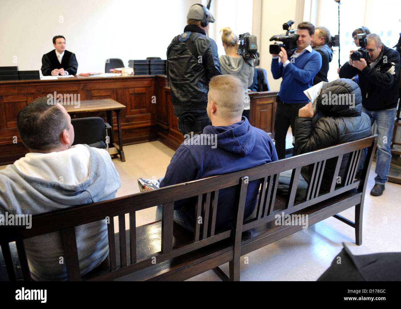 The three defendants (L-R) Jonny J., Sven G. and Michael S. attend the  trial in the case of the stolen skull of pirate Stoertebeker inside the  courtroom in Hamburg, Germany, 07 December