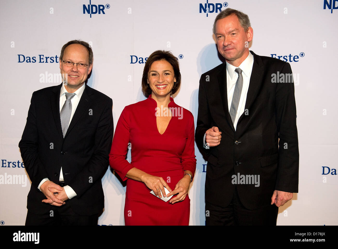 Kai Gniffke (L-R), 'Tagesschau' chief editor, TV host Sandra Maischberger and NDR director Lutz Marmor pose at the news show's 60th anniversary party at Cruise Center in Hamburg, Germany, 06 December 2012. Photo: Axel Heimken Stock Photo