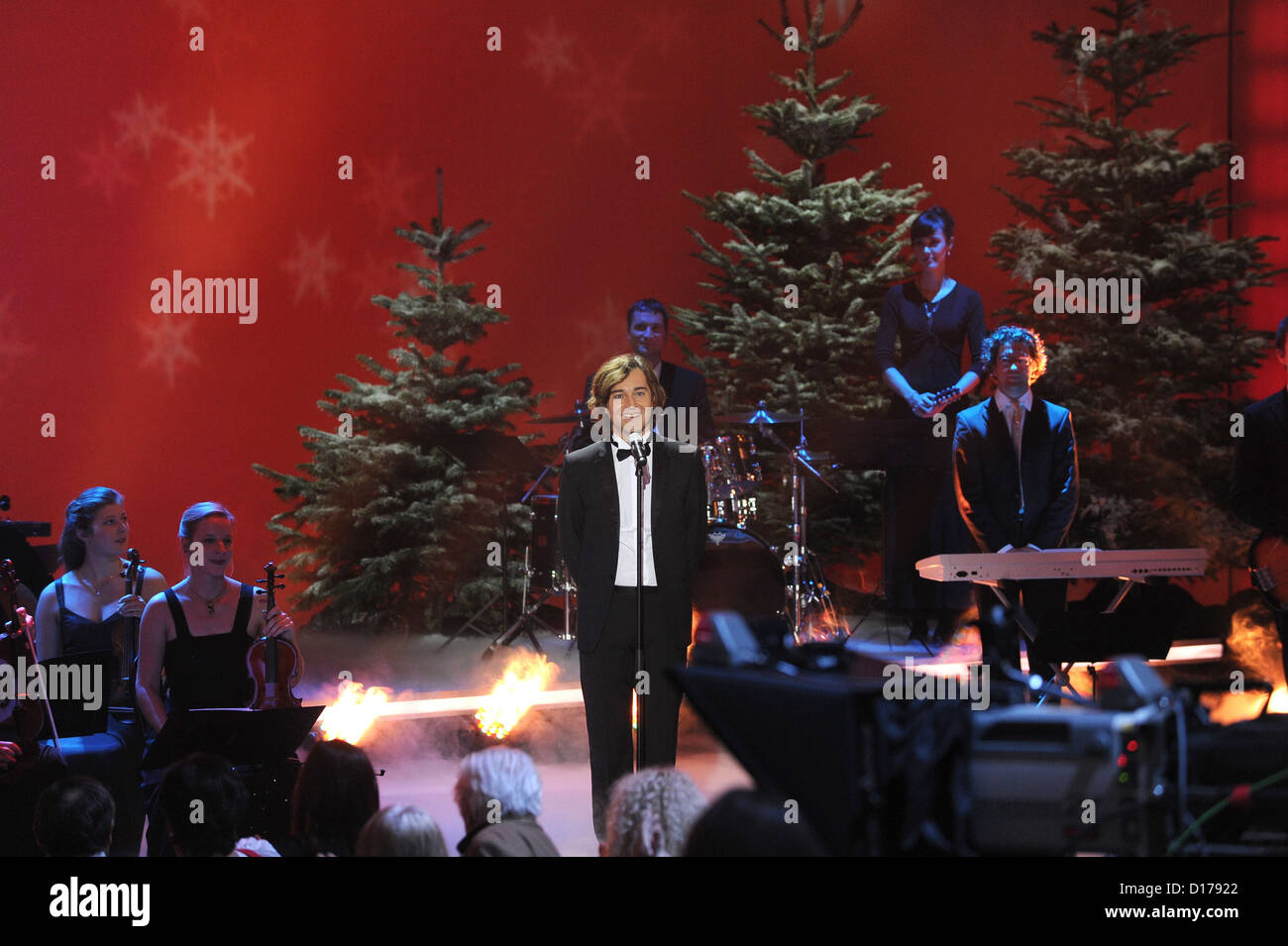 Swiss tenor Erkan Aki performs at the ZDF telethon 'Wonderful Christmas Songs' ('Die schoensten Weihnachts-Hits') to help the cause of relief agencies 'Misereor' and 'Brot fuer die Welt' in Munich, Germany, 06 December 2012. Both agencies support aid in Africa, Asia and Latin America. Photo: Ursula Dueren Stock Photo