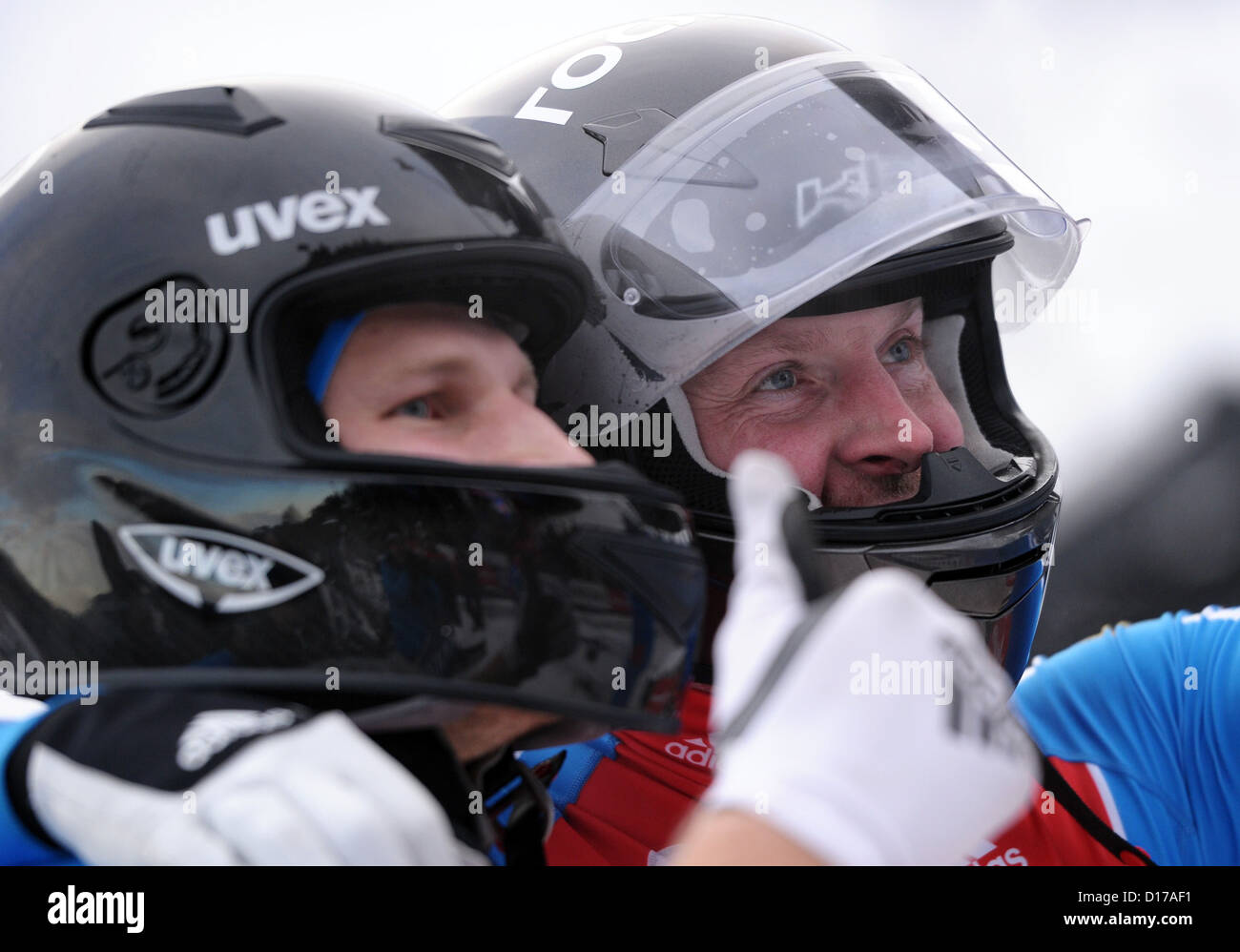 Russian Alexandr Zubkov (front) and Dmitry Trunenkov race in the 2012