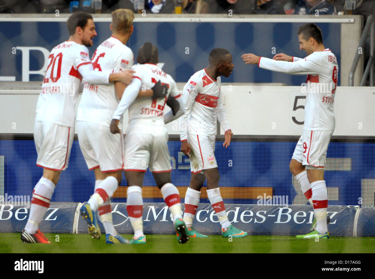 Stuttgart's Vedad Ibisevic (R) celebrates his 1-0 goal with teammates during Bundesliga soccer match between VfB Stuttgart FC Schalke Mercedes Benz Arena in Stutgart Germany 08 December 2012 Photo: MARIJAN MURAT (ATTENTION: EMBARGO CONDITIONS! DFL permits further utilisation up 15 pictures only (no sequntial pictures or video-similar series pictures allowed) via internet online media during match (including halftime) taken inside stadium and/or prior start match DFL permits unrestricted transmission digitised recordings during match exclusively internal editorial processing only (e.g via Stock Photo