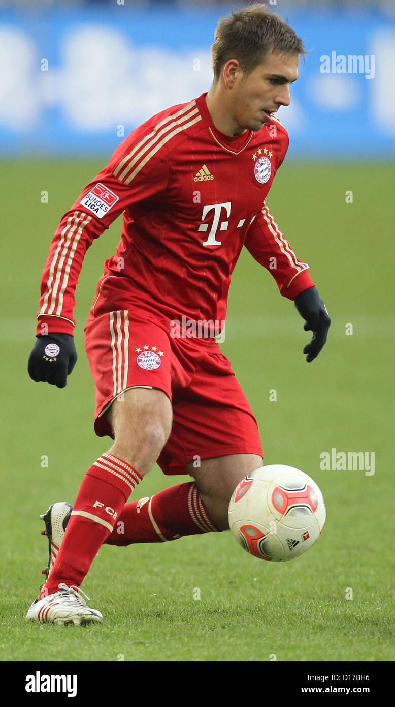 Munich's Philipp Lahm plays the ball during the German Bundesliga match between FC Augsburg and FC Bayern Munich at SGL-Arena in Augsburg, germany, 08 December 2012. Photo: Karl-Josef Hildenbrand Stock Photo