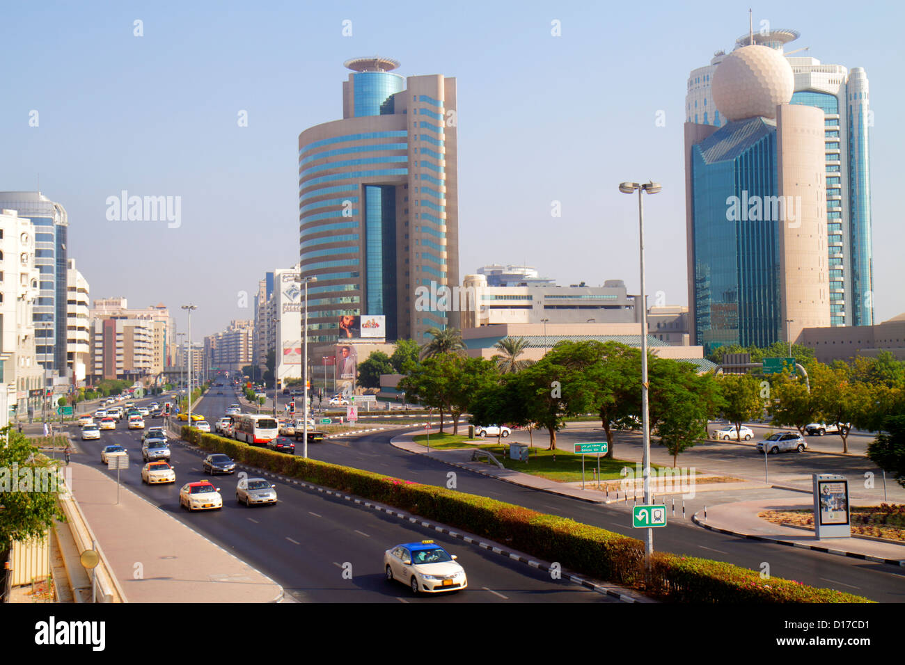 Dubai UAE,United Arab Emirates,Deira,Al Maktoum Road,traffic,taxi,taxis,cab,cabs,Dubai Creek Tower,Al Reem Tower,Etisalat Tower I,UAE121012036 Stock Photo